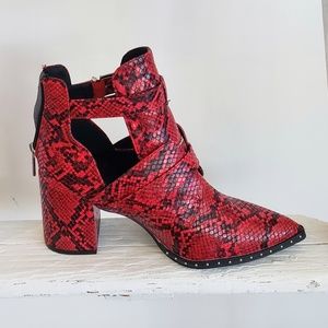 Fierce snakeskin red hot leather booties.